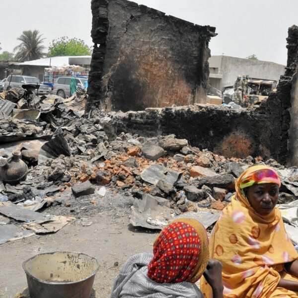 Women sit at Gamboru central market  on May 11, 2014  burnt by suspected Boko Haram insurgents during the May 5 attack at Ngala in Gamboru Ngala district, Borno State in northeastern Nigeria . AFP PHOTO/STRINGERSTR/AFP/Getty Images ** OUTS - ELSENT, FPG - OUTS * NM, PH, VA if sourced by CT, LA or MoD **